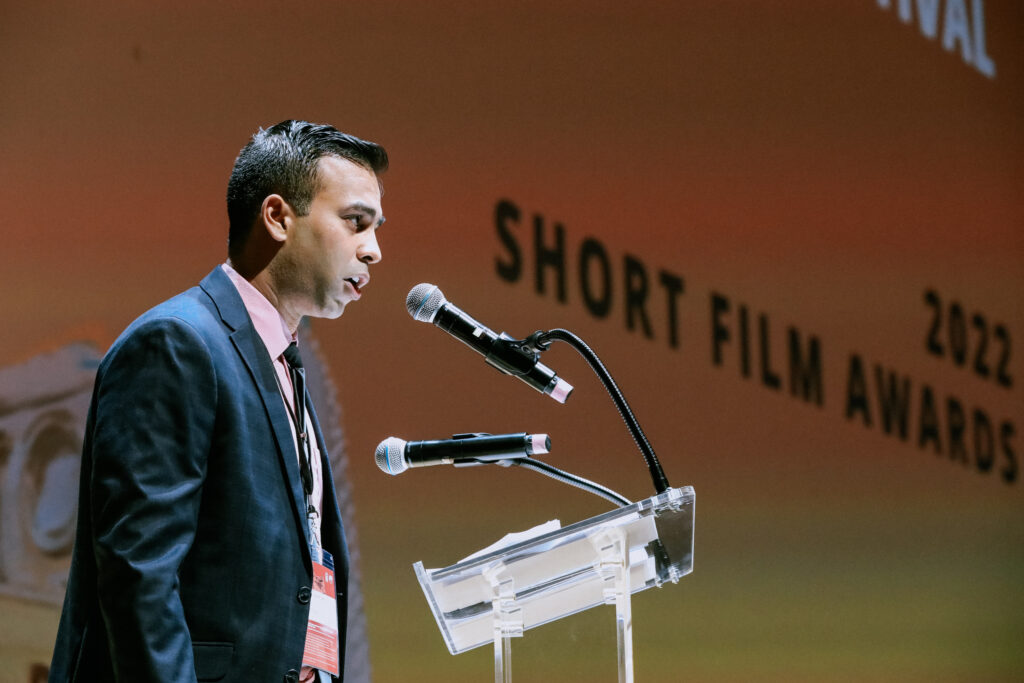 Vasisth gives acceptance speech at Miami Film Festival 2022.